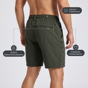Wandershorts Herren dunkelgrün - Detailansicht Reißverschlusstasche, Elastikbund und Rückentasche